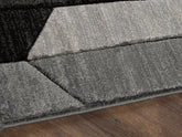 Elite Furniture Outlet - Ashley Furniture - Chayse Rug - 6'6" x 9'6" Rug / Black/Gray - R403461