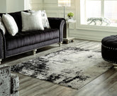 Elite Furniture Outlet - Ashley Furniture - Zekeman Rug - 5'3" x 7'7" Rug / Black/Cream/Gray - R404922