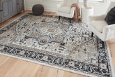 Elite Furniture Outlet - Ashley Furniture - Gregmoore Rug - 5'2" x 6'10" Washable Rug / Multi - R405822
