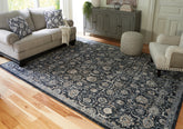 Elite Furniture Outlet - Ashley Furniture - Hilcott Rug - 5'3" x 7'3" Rug / Blue/Cream/Brown - R406112