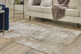 Elite Furniture Outlet - Ashley Furniture - Grifflain Rug - 7'10" x 10'3" Washable Rug / Tan/Brown/Gray - R406231
