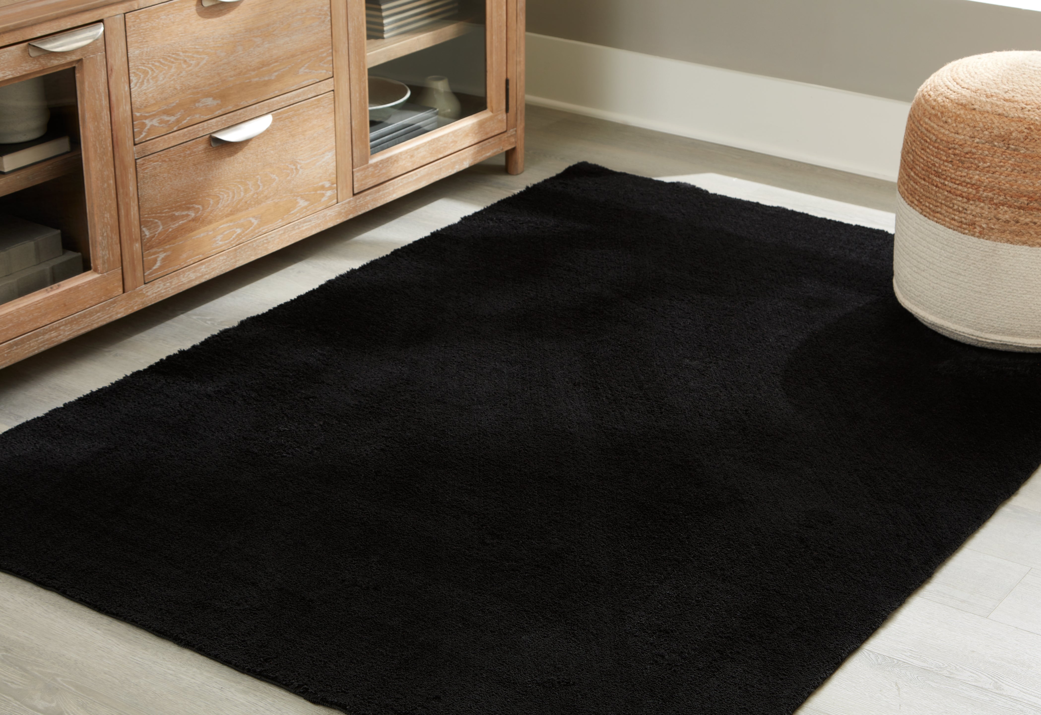 Elite Furniture Outlet - Ashley Furniture - Anaben Rug - 5' x 7' Washable Rug / Black - R406312