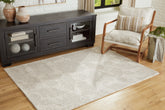 Elite Furniture Outlet - Ashley Furniture - Chadess Rug - 5' x 7' Rug / Linen/Taupe - R406362