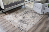 Elite Furniture Outlet - Ashley Furniture - Elaning Rug - 8' x 10' Rug / Black/Gray/Cream - R406701