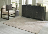 Elite Furniture Outlet - Ashley Furniture - Jadott Rug - 5' x 7' Rug / Beige/Brown - R406802