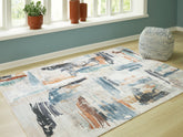 Elite Furniture Outlet - Ashley Furniture - Hessland Rug - 8' x 10' Washable Rug / Multi - R407051