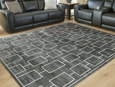 Elite Furniture Outlet - Ashley Furniture - Elderland Rug - Washable 7'6" x 9'6" Area Rug / Black/Gray - R407401