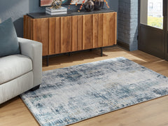 Elite Furniture Outlet - Ashley Furniture - Arlenmont Rug - 5' x 7' Area Rug / Blue/White/Brown - R407482