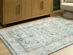 Elite Furniture Outlet - Ashley Furniture - Ladstoney Rug - 5' x 7' Area Rug / Teal/Beige/Ochre - R407502