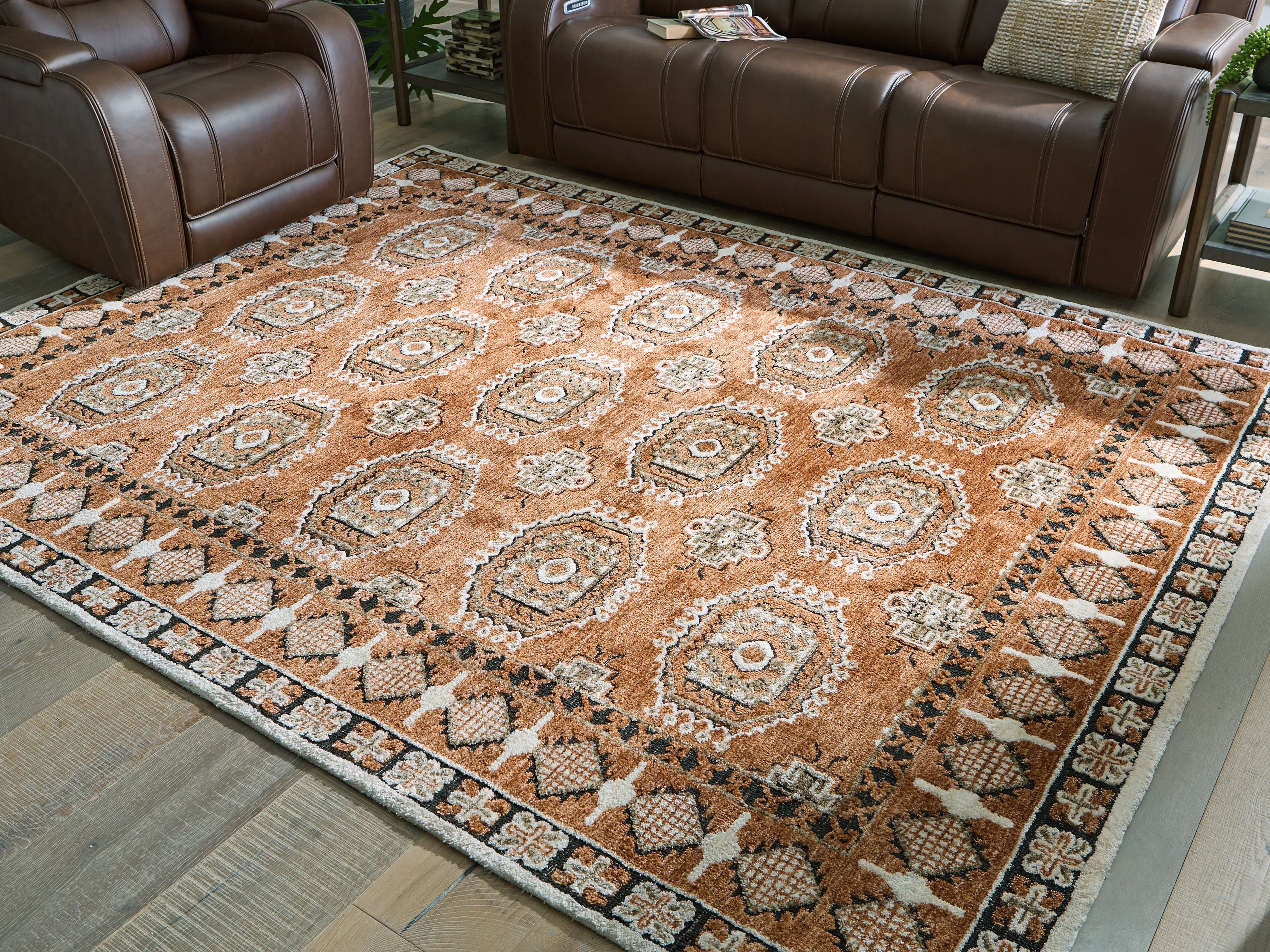Elite Furniture Outlet - Ashley Furniture - Qaabiz Rug - 5' x 7' Area Rug / Sienna/Ivory/Black - R407522