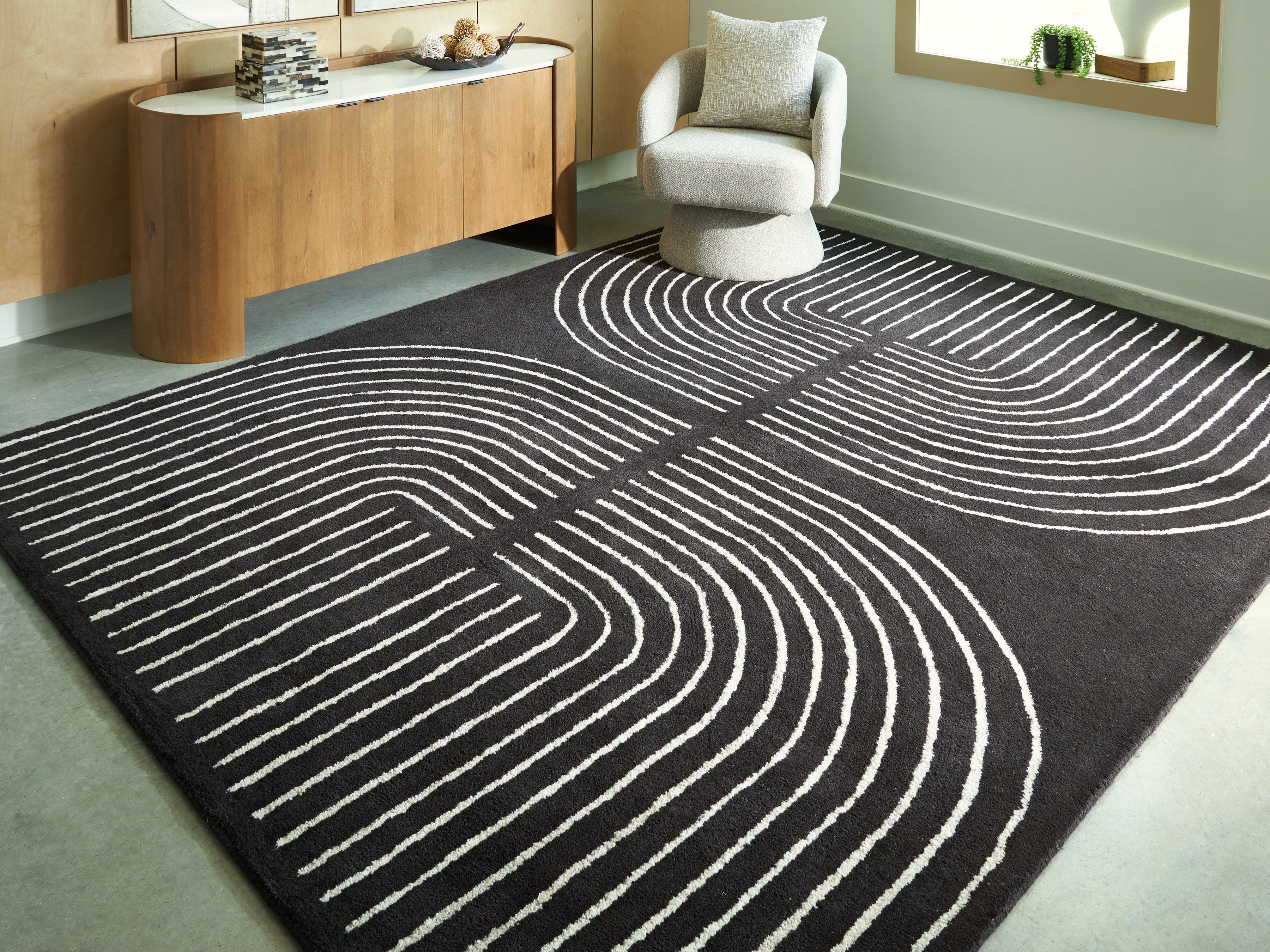 Elite Furniture Outlet - Ashley Furniture - Eldonmore Rug - 7'8" x 10' Area Rug / Black/Ivory - R407571