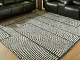 Elite Furniture Outlet - Ashley Furniture - Kurtmen Rug - 5' x 7' Area Rug / Black/Ivory - R407592