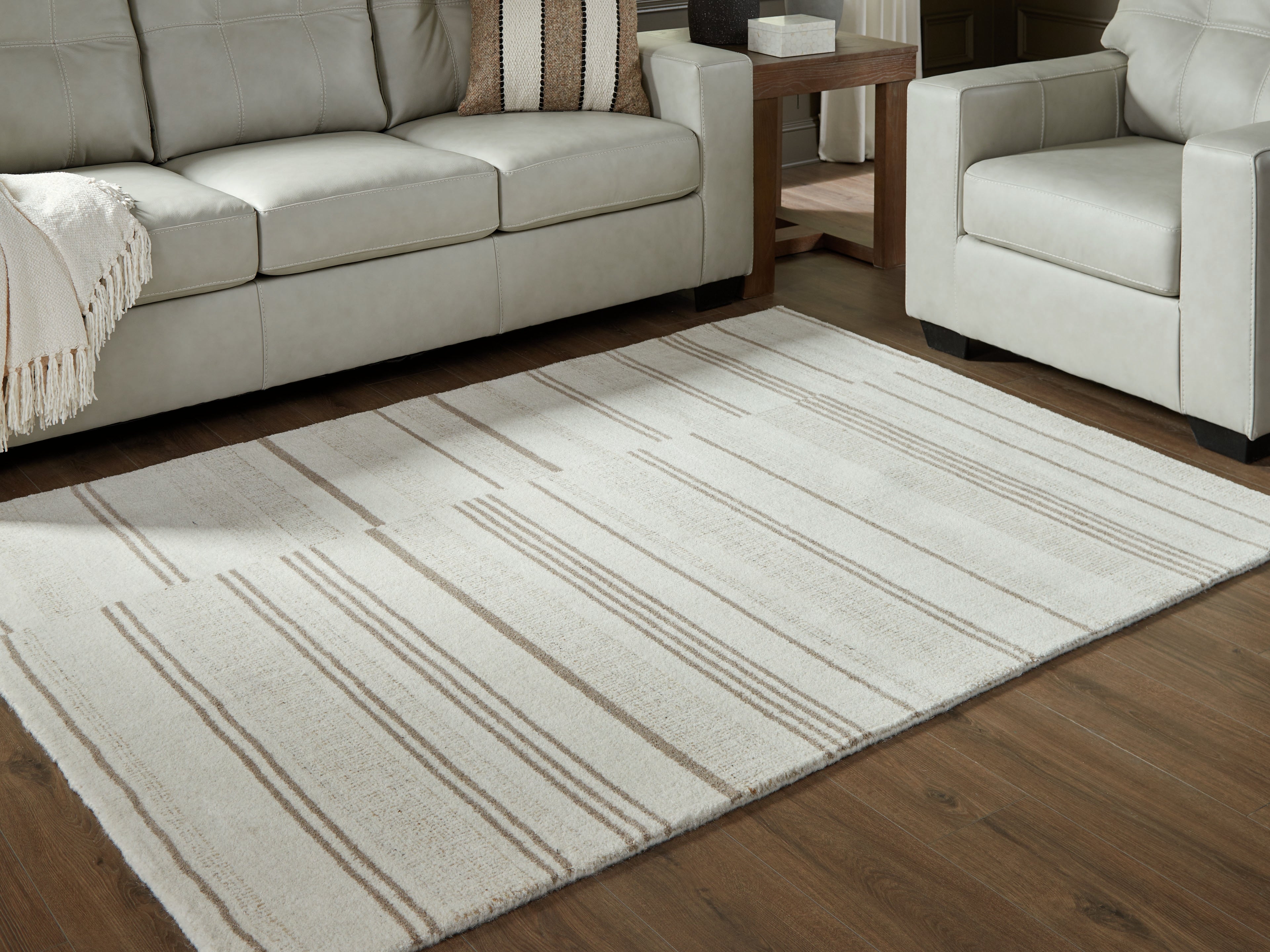 Elite Furniture Outlet - Ashley Furniture - Gadence Rug - 5' x 7' Area Rug / Ivory/Tan - R407642