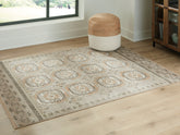 Elite Furniture Outlet - Ashley Furniture - Bachby Rug - 5'3" x 7' Area Rug / Multi - R407682