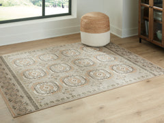 Elite Furniture Outlet - Ashley Furniture - Bachby Rug - 5'3" x 7' Area Rug / Multi - R407682