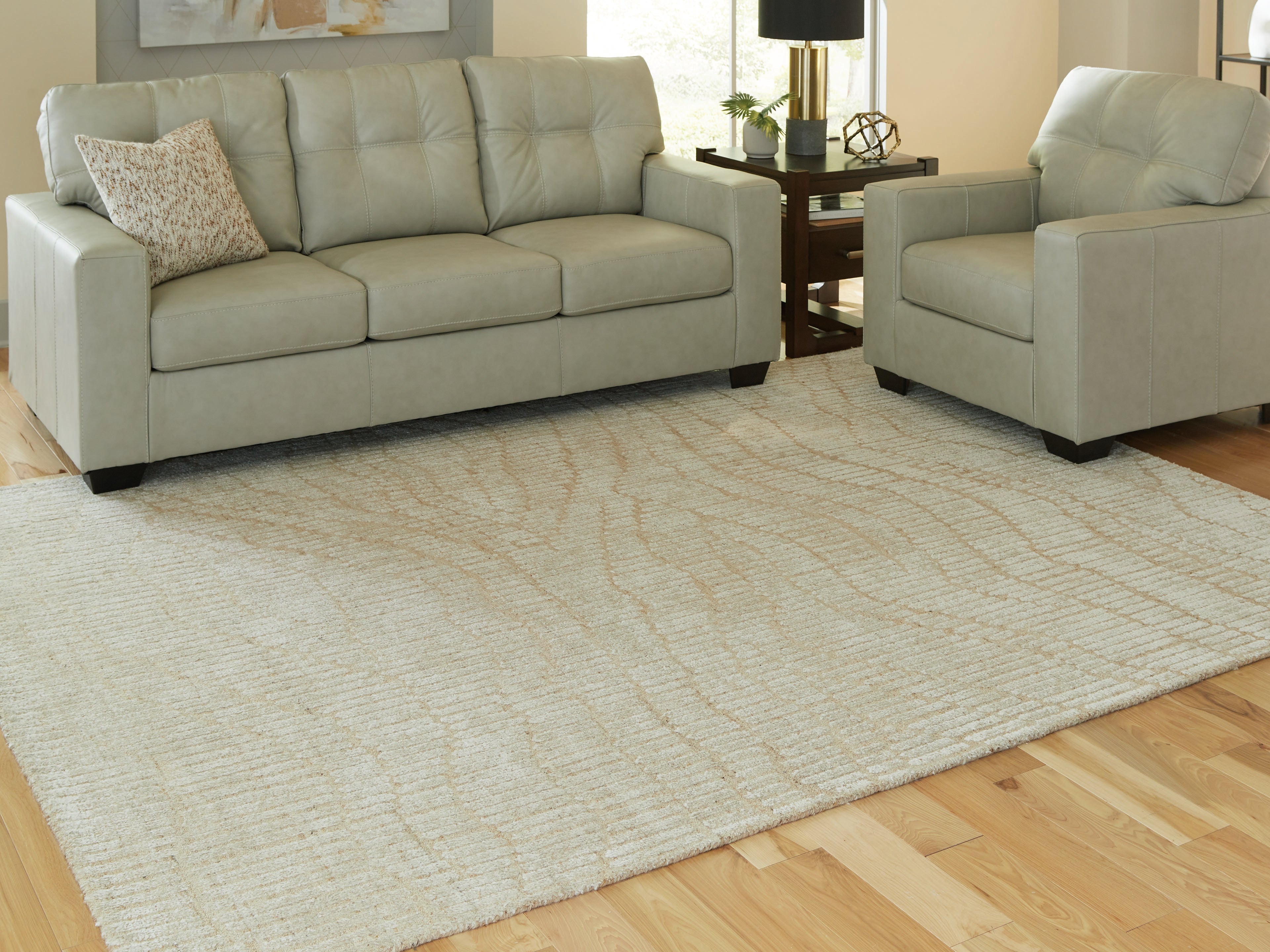 Elite Furniture Outlet - Ashley Furniture - Jaseena Rug - 7'8" x 10' Area Rug / Beige/Tan - R407721