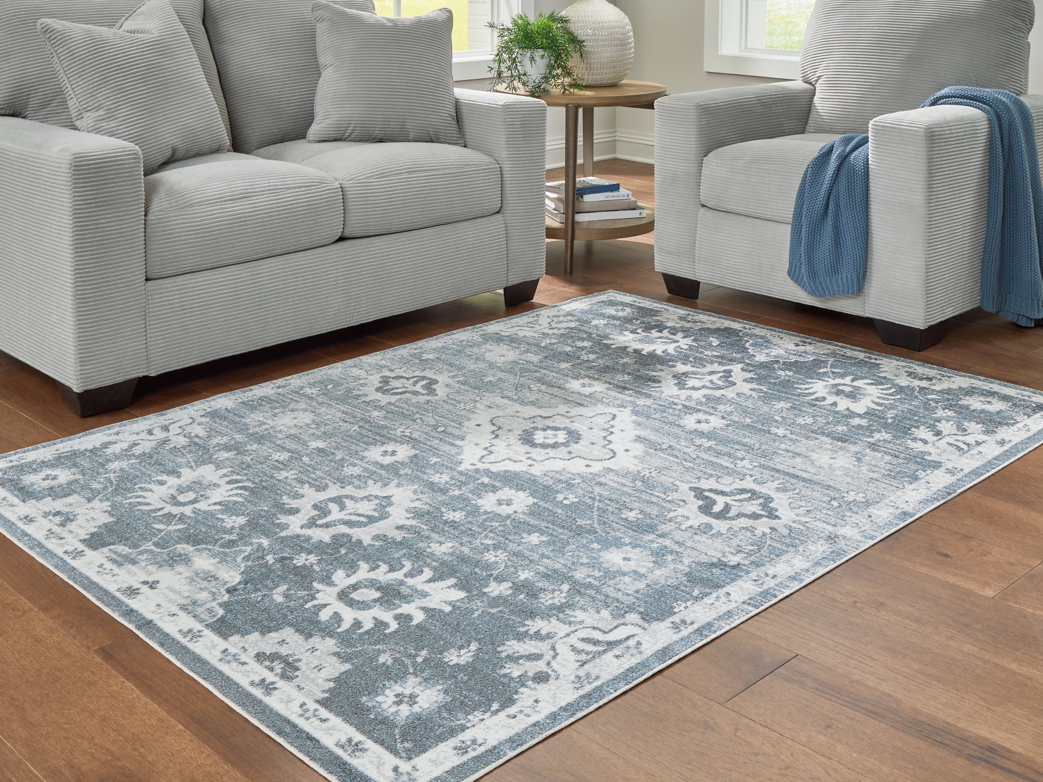 Elite Furniture Outlet - Ashley Furniture - Avanworths Rug - Washable 7'10" x 10' Area Rug / Blue/Gray/Ivory - R407791