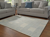 Elite Furniture Outlet - Ashley Furniture - Dylanton Rug - 7'8" x 10' Area Rug / Ivory/Blue - R407811