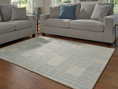 Elite Furniture Outlet - Ashley Furniture - Dylanton Rug - 7'8" x 10' Area Rug / Ivory/Blue - R407811