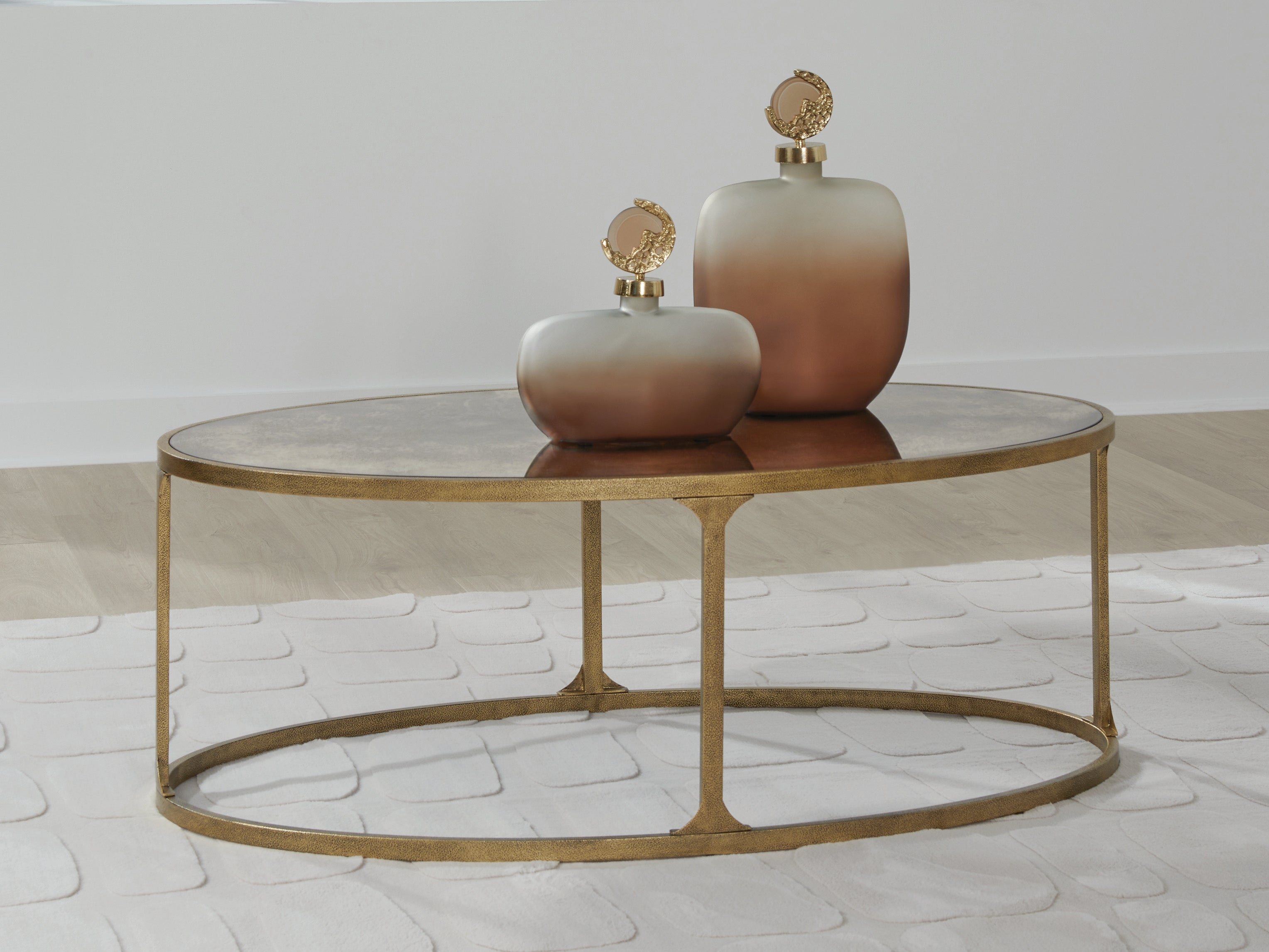 Elite Furniture Outlet - Ashley Furniture - Korajane Coffee Table - Oval Cocktail Table / Antique Gold - T399-0