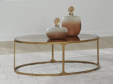 Elite Furniture Outlet - Ashley Furniture - Korajane Coffee Table - Oval Cocktail Table / Antique Gold - T399-0