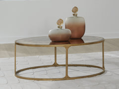 Elite Furniture Outlet - Ashley Furniture - Korajane Coffee Table - Oval Cocktail Table / Antique Gold - T399-0