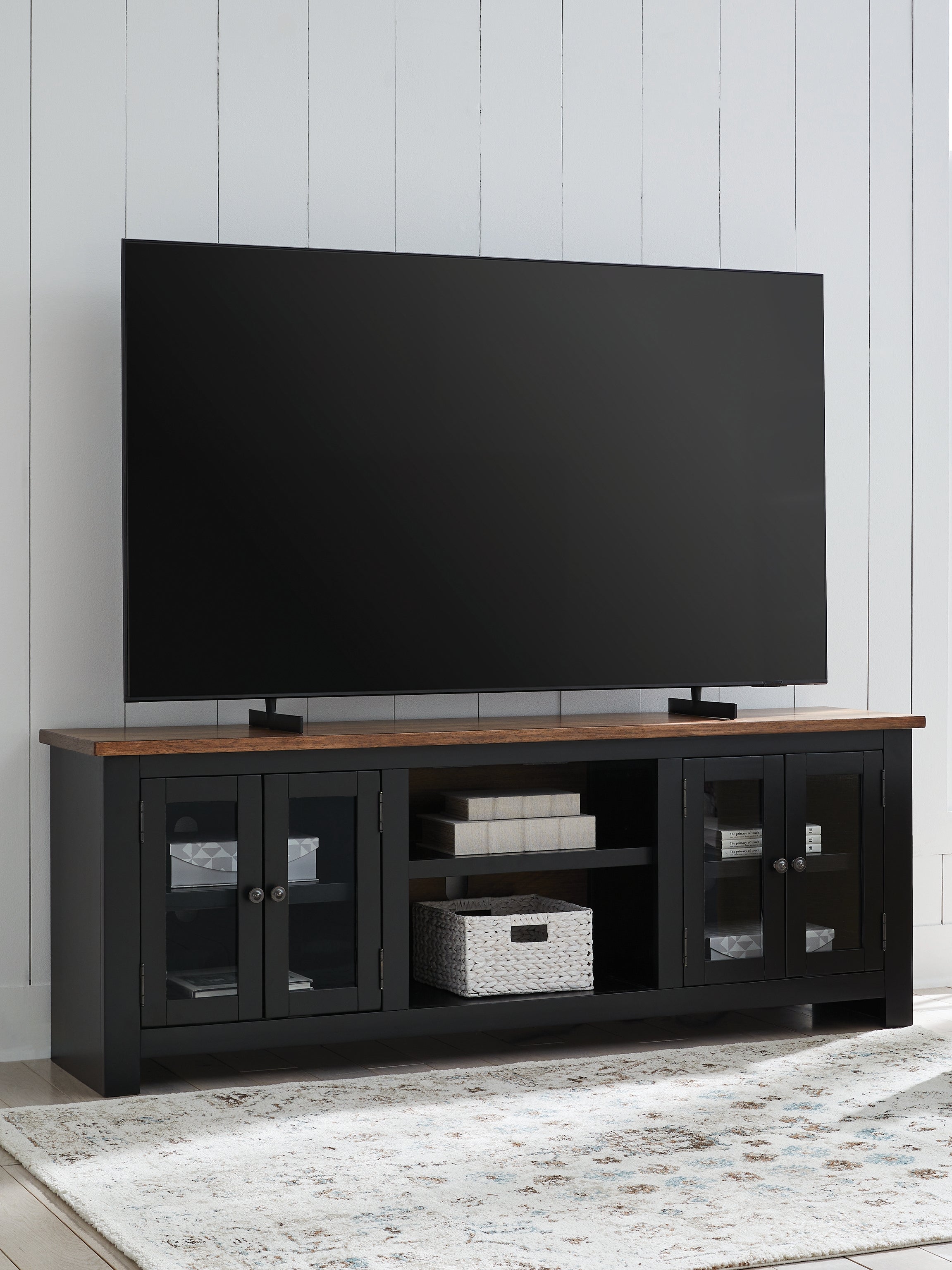 Elite Furniture Outlet - Ashley Furniture - Wildenauer 76" TV Stand - 76" / Brown/Black - W664-68