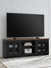 Elite Furniture Outlet - Ashley Furniture - Wildenauer 76" TV Stand - 76" / Brown/Black - W664-68