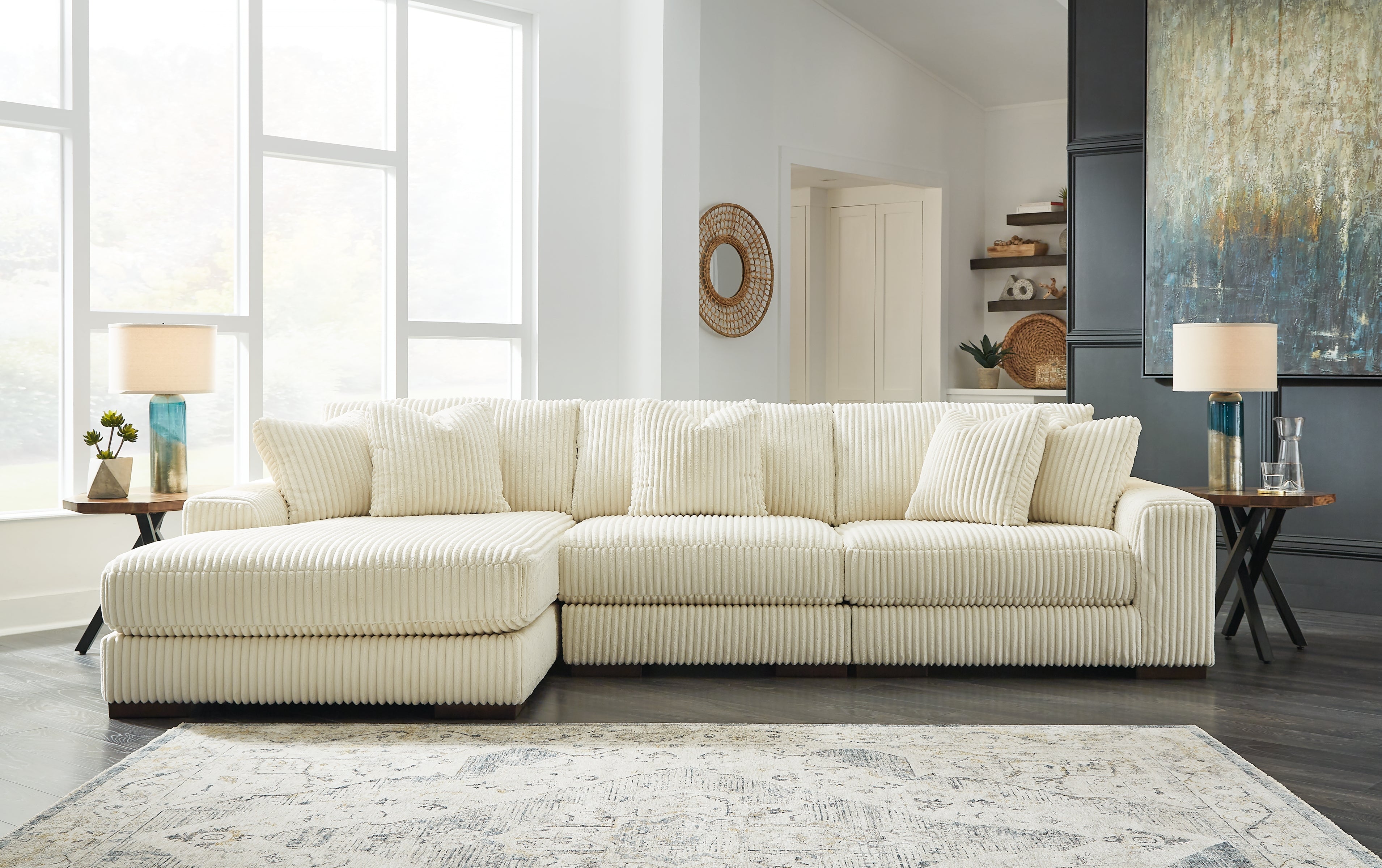 Elite Furniture Outlet - Ashley Furniture - Lindyn Sectional - RAF 3-Piece Sectional with Chaise / Ivory - 21104S13