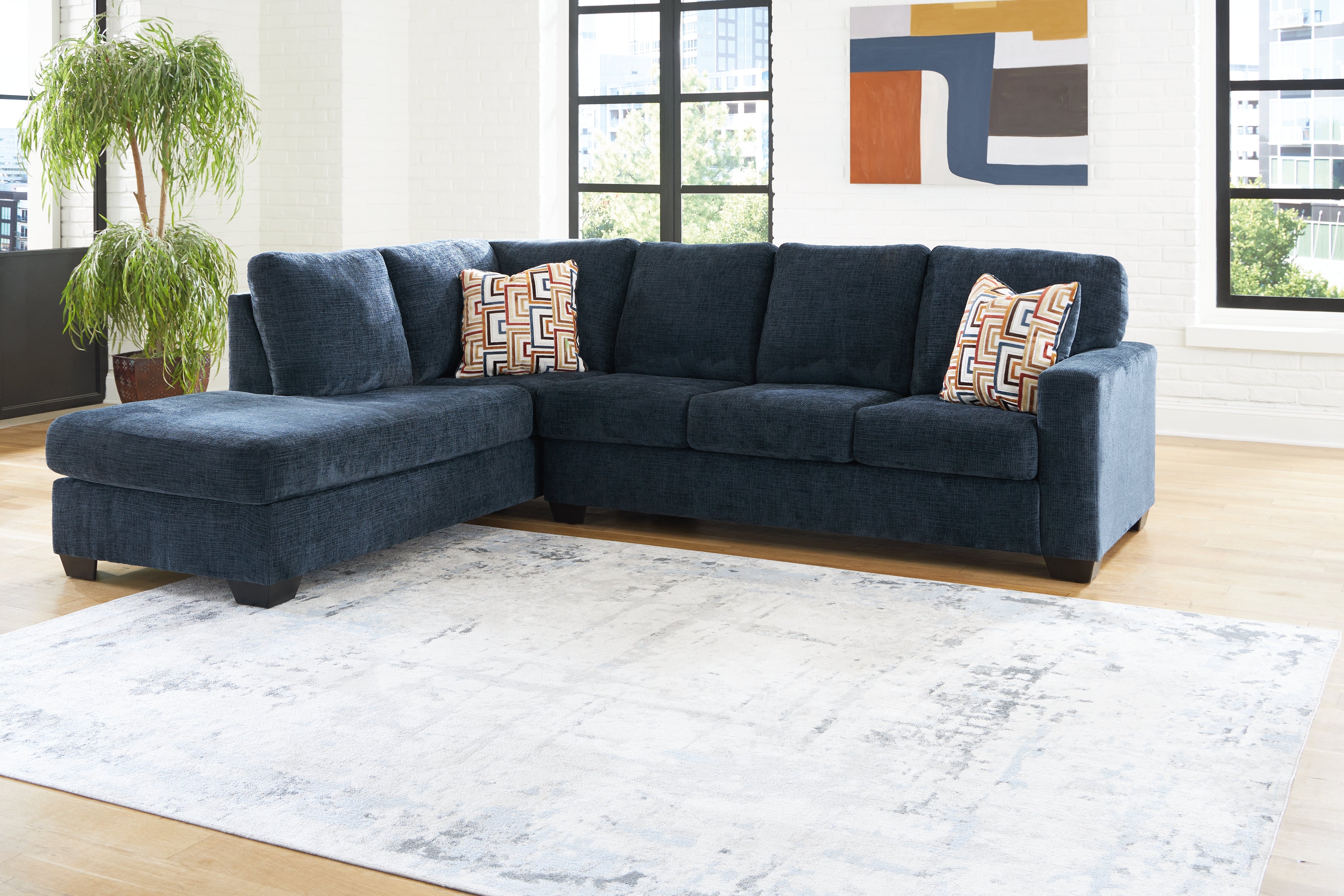 Elite Furniture Outlet - Ashley Furniture - Aviemore Sectional - RAF 2-Piece Sectional with Chaise / Ink - 24303S1