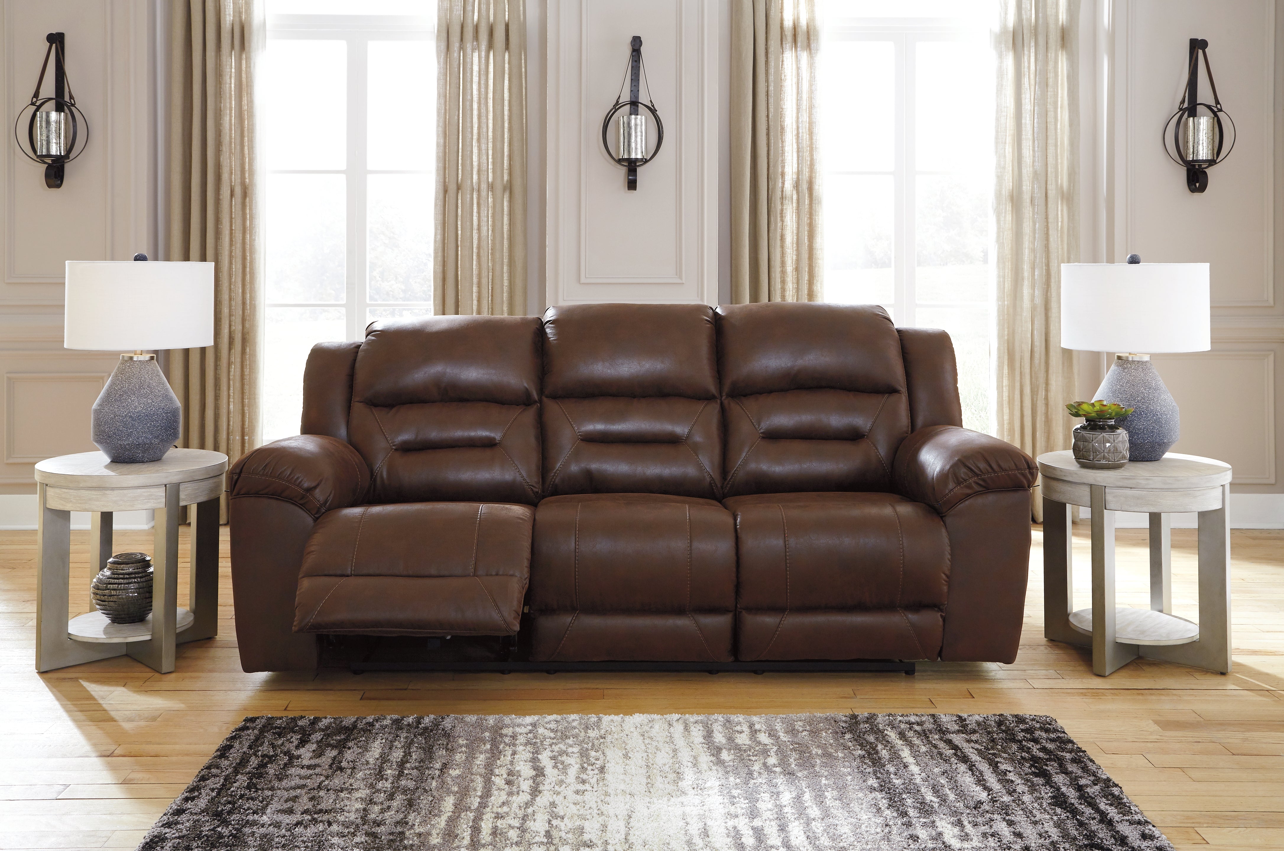 Elite Furniture Outlet - Ashley Furniture - Stoneland Living Room - Reclining Sofa / Chocolate - 3990488