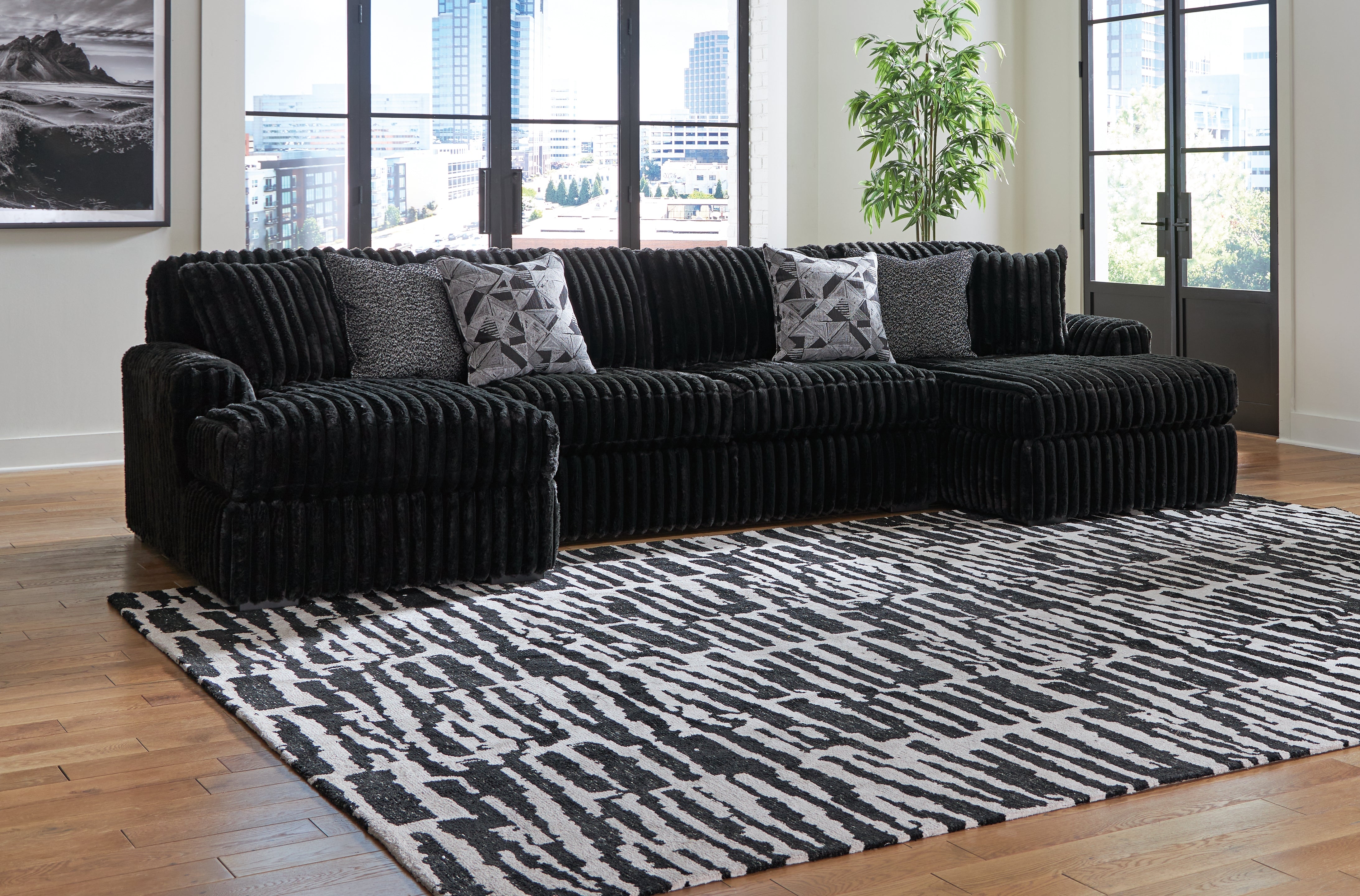 Elite Furniture Outlet - Ashley Furniture - Midnight-Madness Sectional - RAF 3-Piece Sectional with Chaise / Onyx - 98103S5