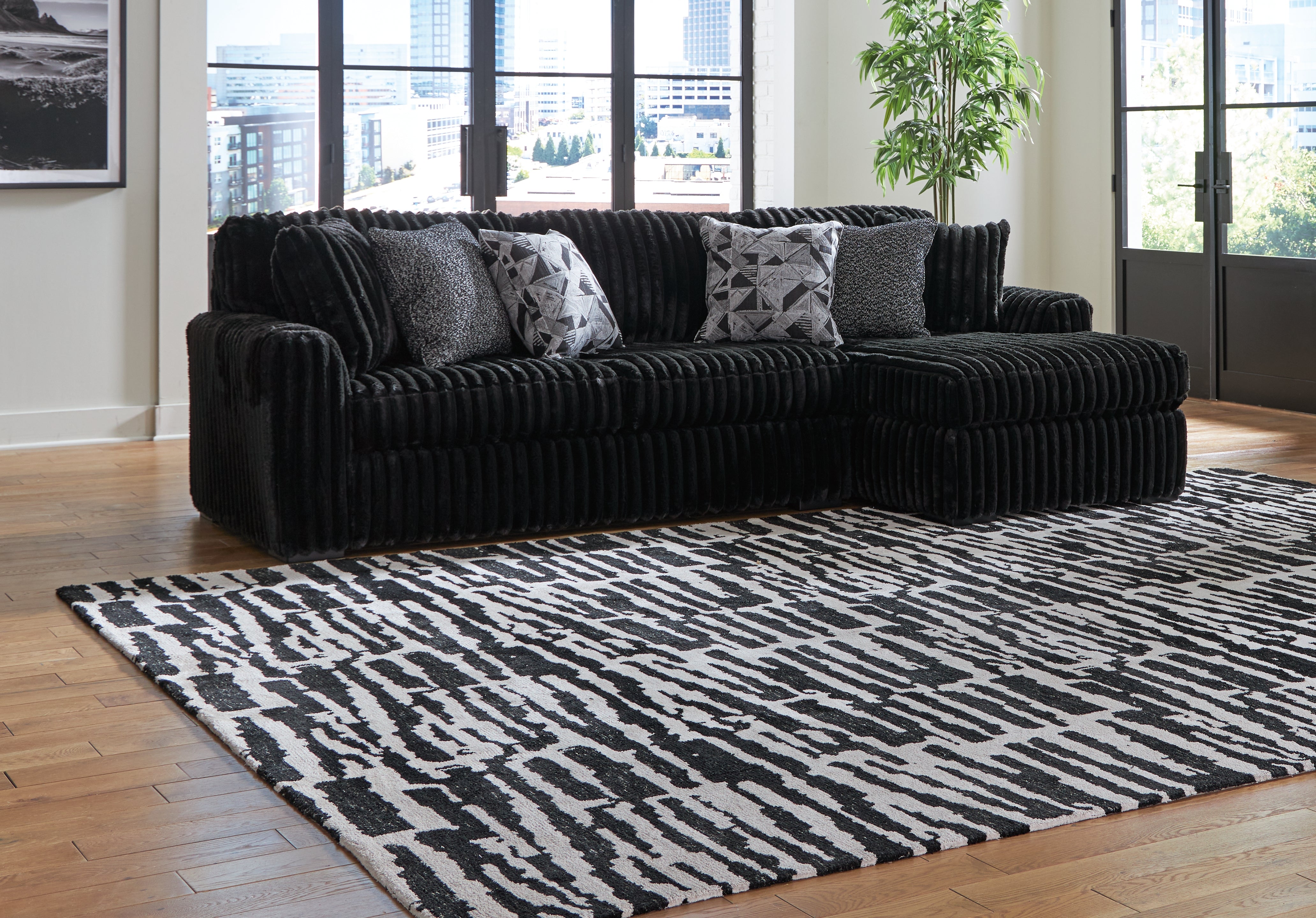 Elite Furniture Outlet - Ashley Furniture - Midnight-Madness Sectional - LAF 2-Piece Sectional Sofa with Chaise / Onyx - 98103S2