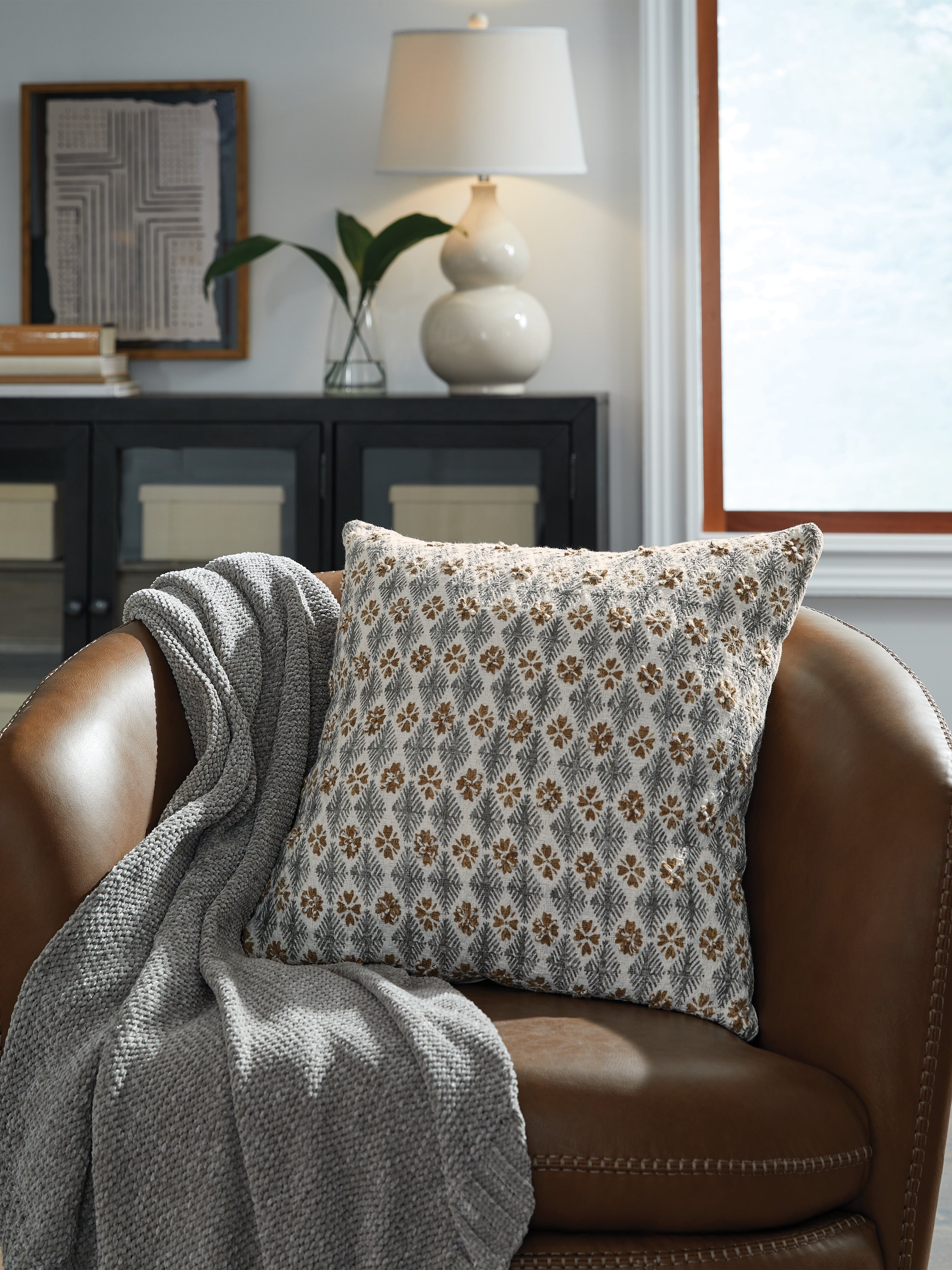 Elite Furniture Outlet - Ashley Furniture - Dainwick Pillows - Pillow / White/Gray/Brown - A1001102P