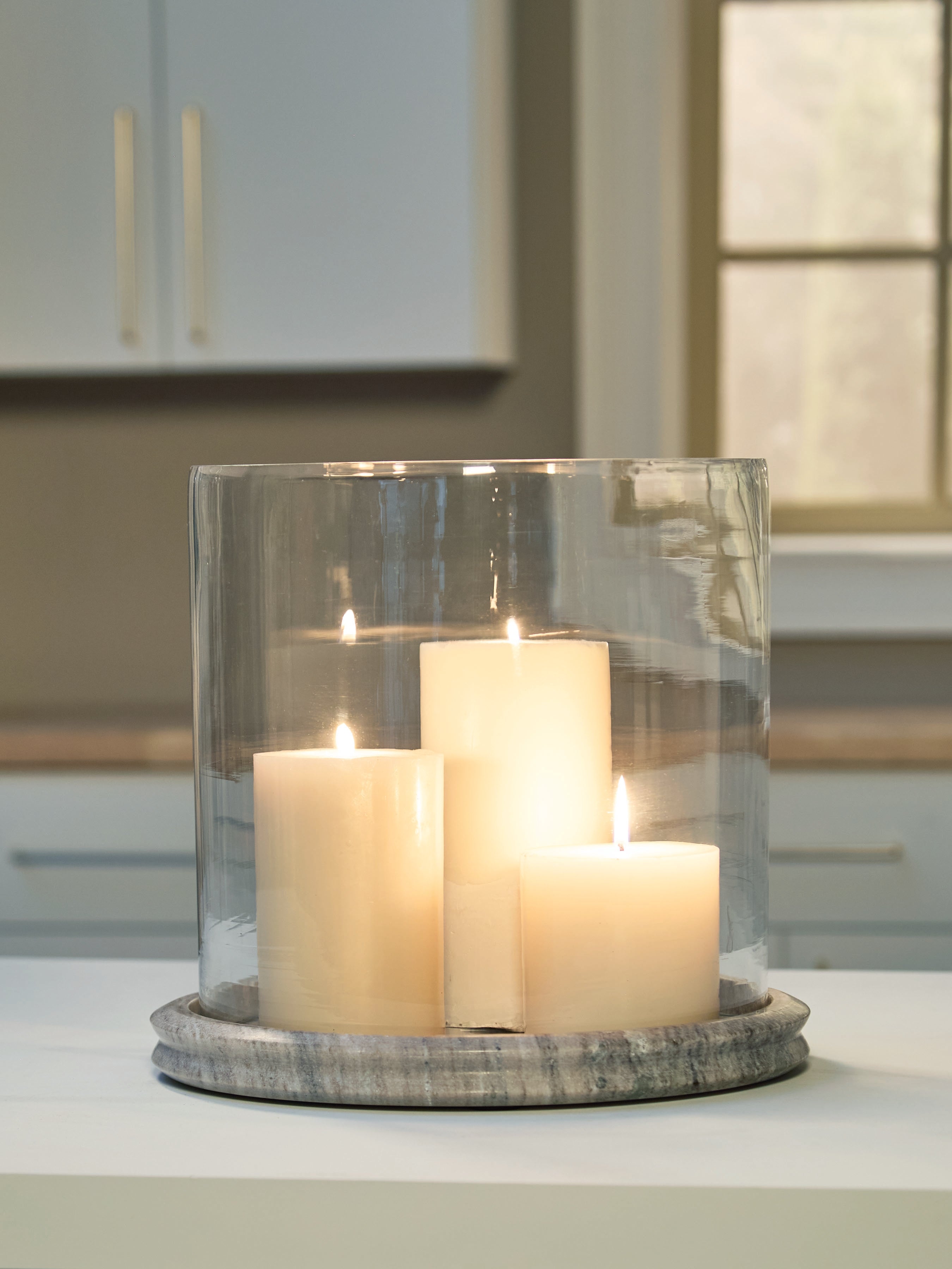 Elite Furniture Outlet - Ashley Furniture - Saskia Candle Holder - Candle Holder / Clear/Beige - A2000847