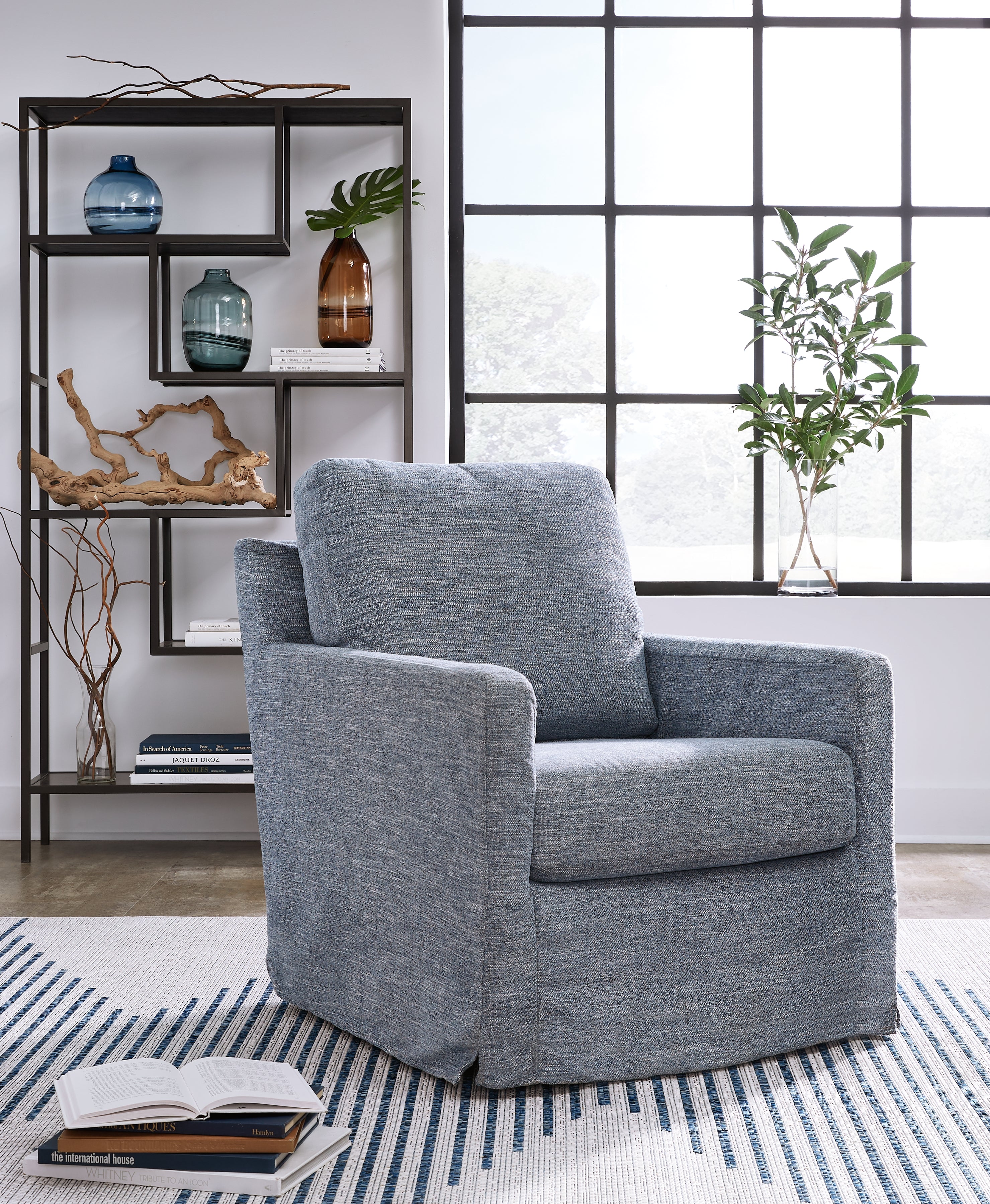 Elite Furniture Outlet - Ashley Furniture - Nenana Next-Gen Nuvella Swivel Glider Accent Chair - Swivel Glider Accent Chair / Denim - A3000646