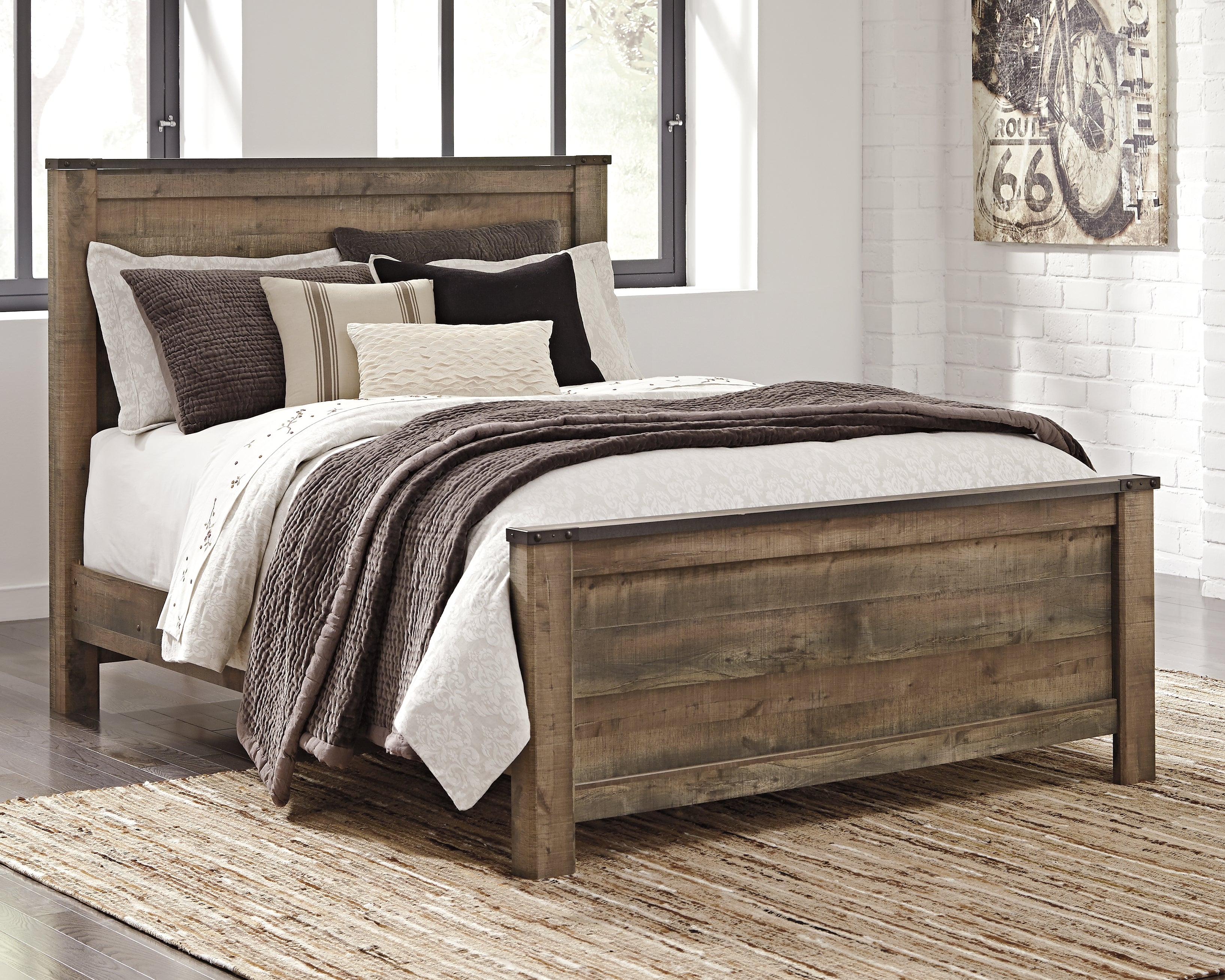 Elite Furniture Outlet - Ashley Furniture - Trinell Bedroom - Queen Panel Bed / Brown - B446B11