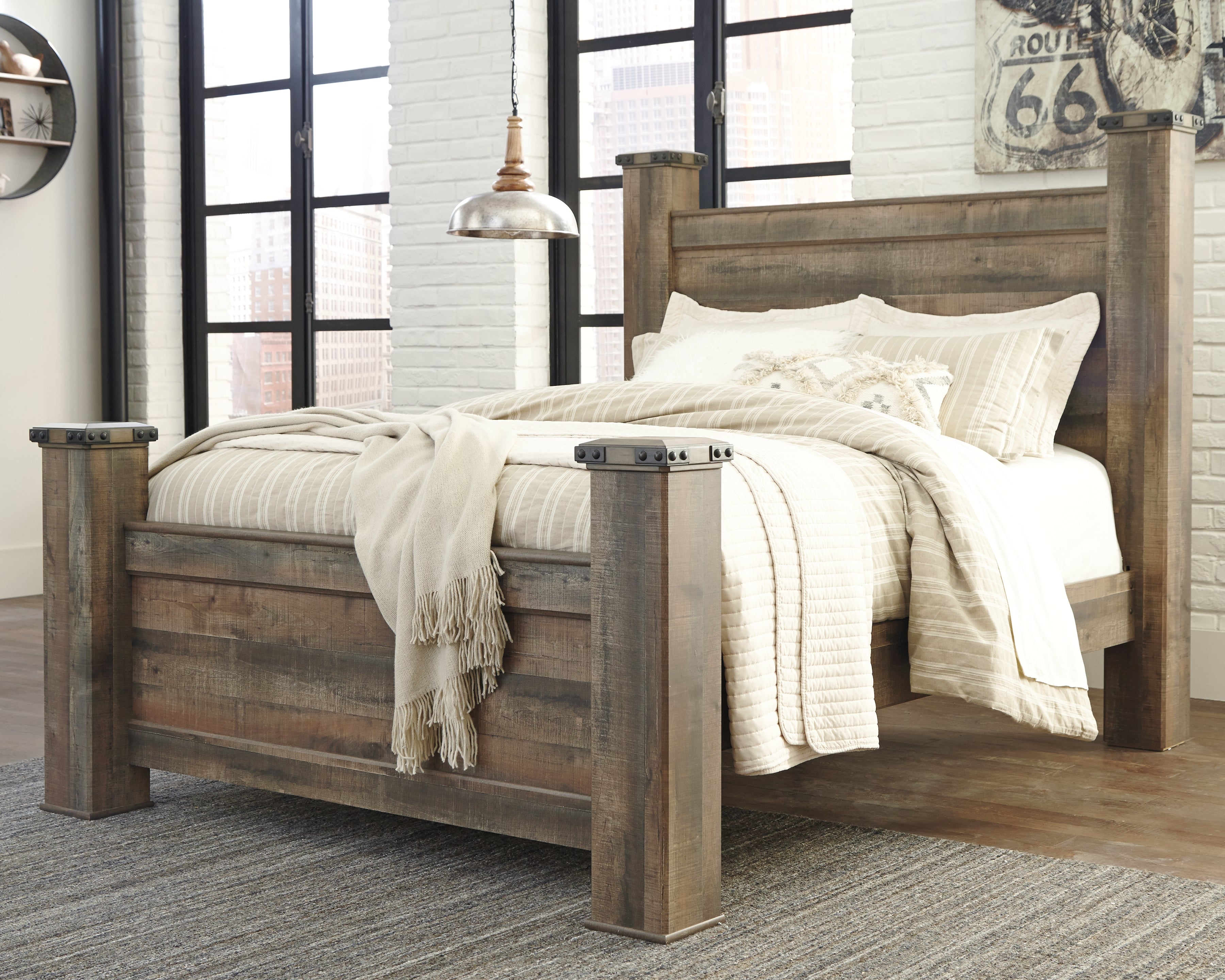 Elite Furniture Outlet - Ashley Furniture - Trinell Bedroom - Queen Poster Bed / Brown - B446B40
