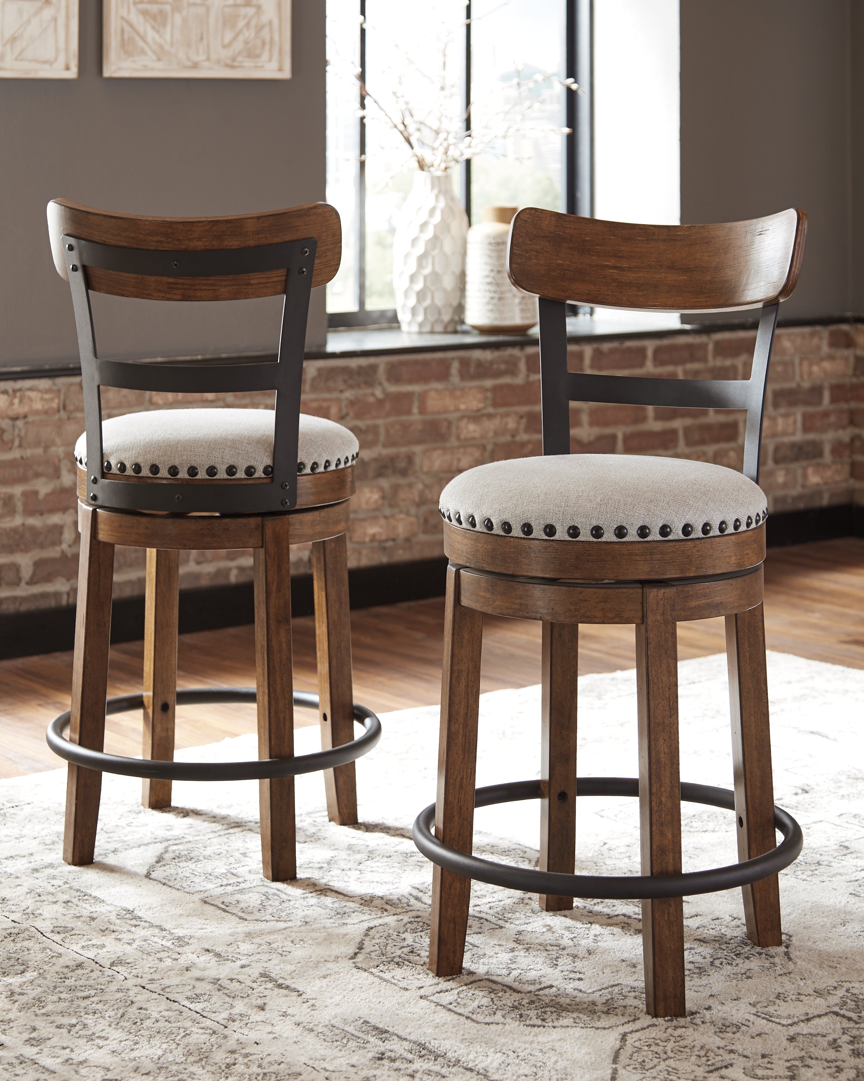 Elite Furniture Outlet - Ashley Furniture - Valebeck Dining Room - UPH Swivel Barstool (1/CN) / Brown - D546-424