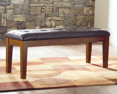 Elite Furniture Outlet - Ashley Furniture - Ralene Dining Bench - Large UPH Dining Room Bench / Medium Brown / 50"W x 16"D x 19"H - D594-00