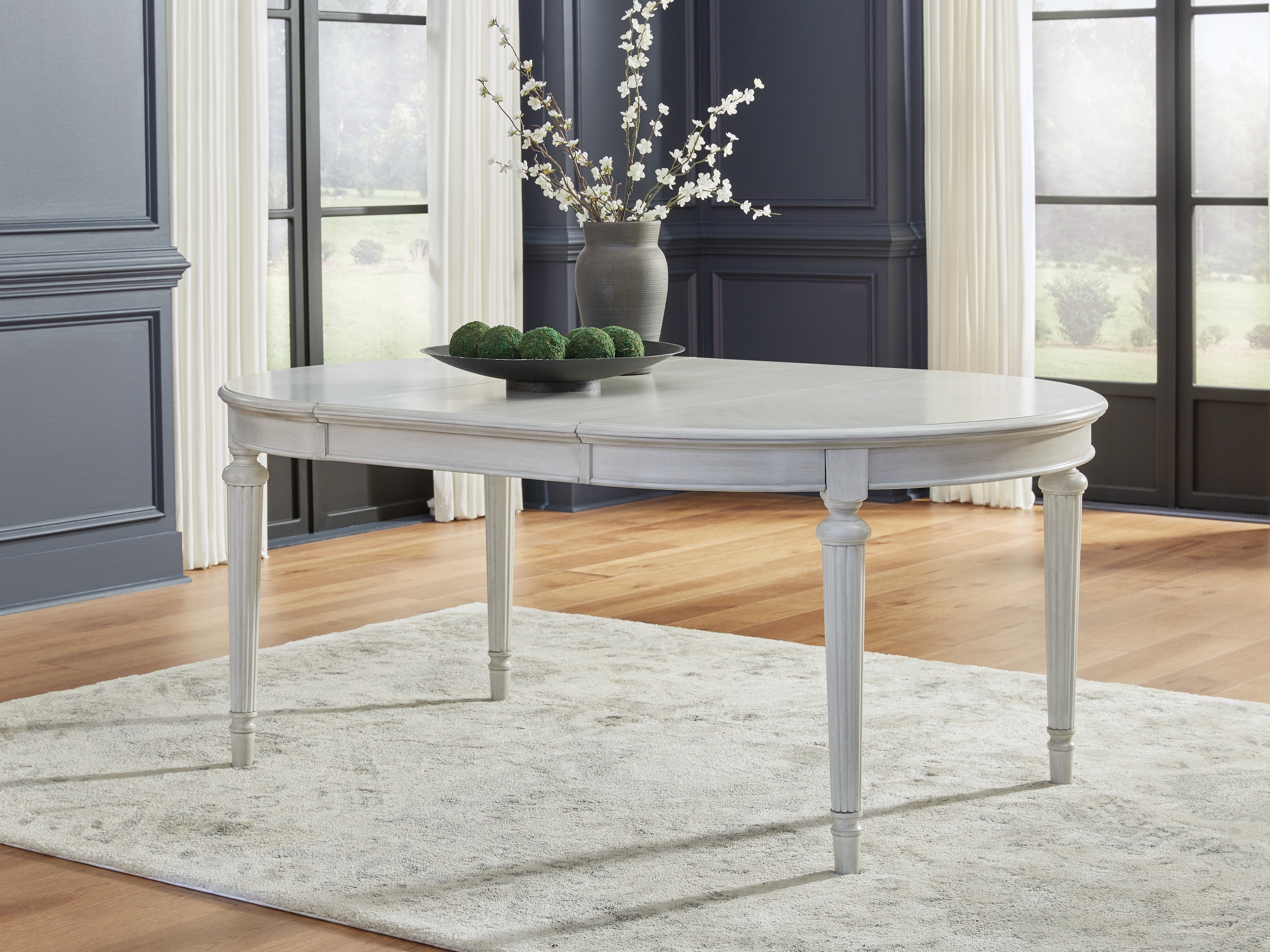 Elite Furniture Outlet - Ashley Furniture - Montelaine Dining Room - Oval Dining Room EXT Table / Antique White - D795-35