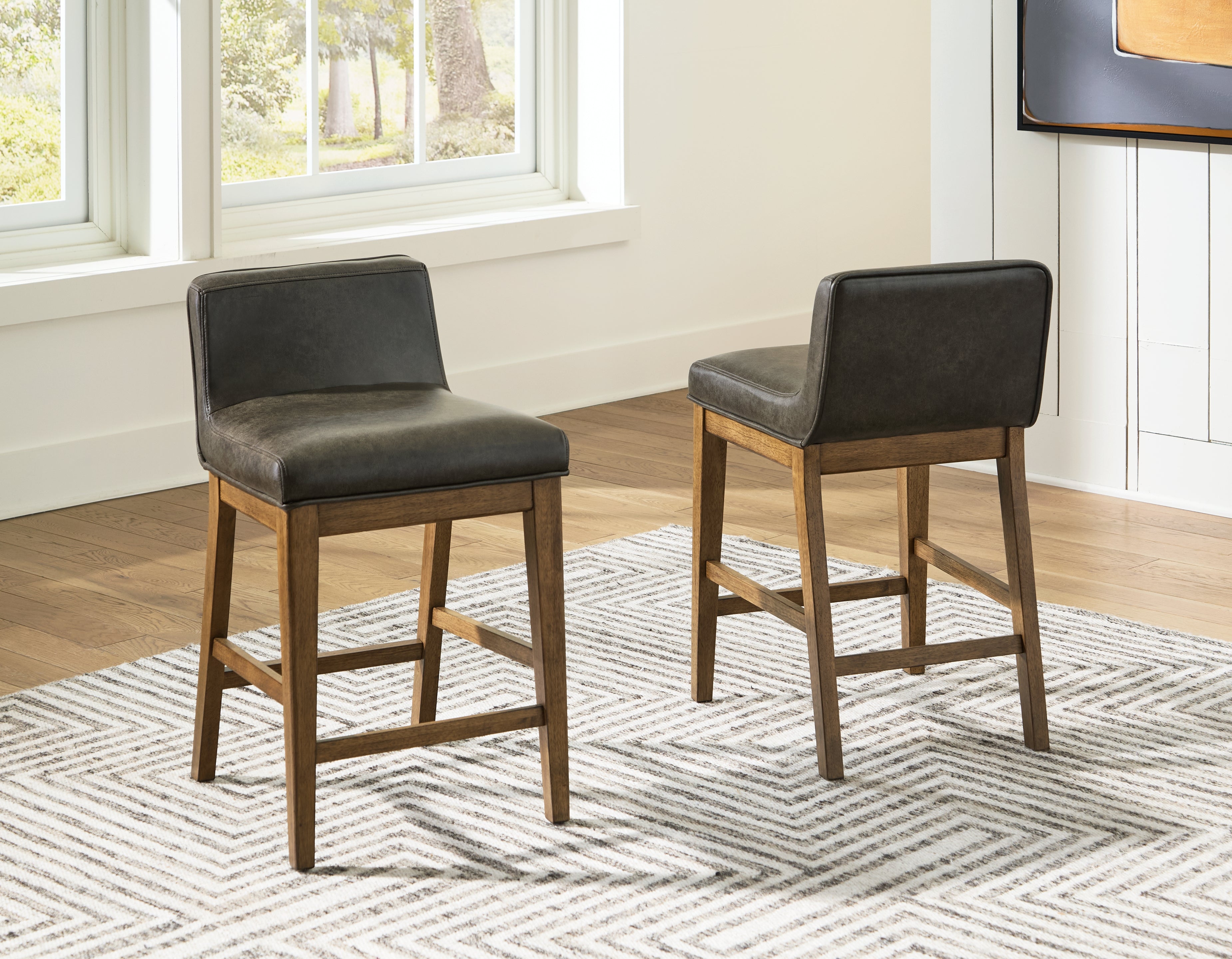 Elite Furniture Outlet - Ashley Furniture - Cabalynn Dining Room - Counter Height Barstool (Set of 2) / Light Brown - D974-124X2