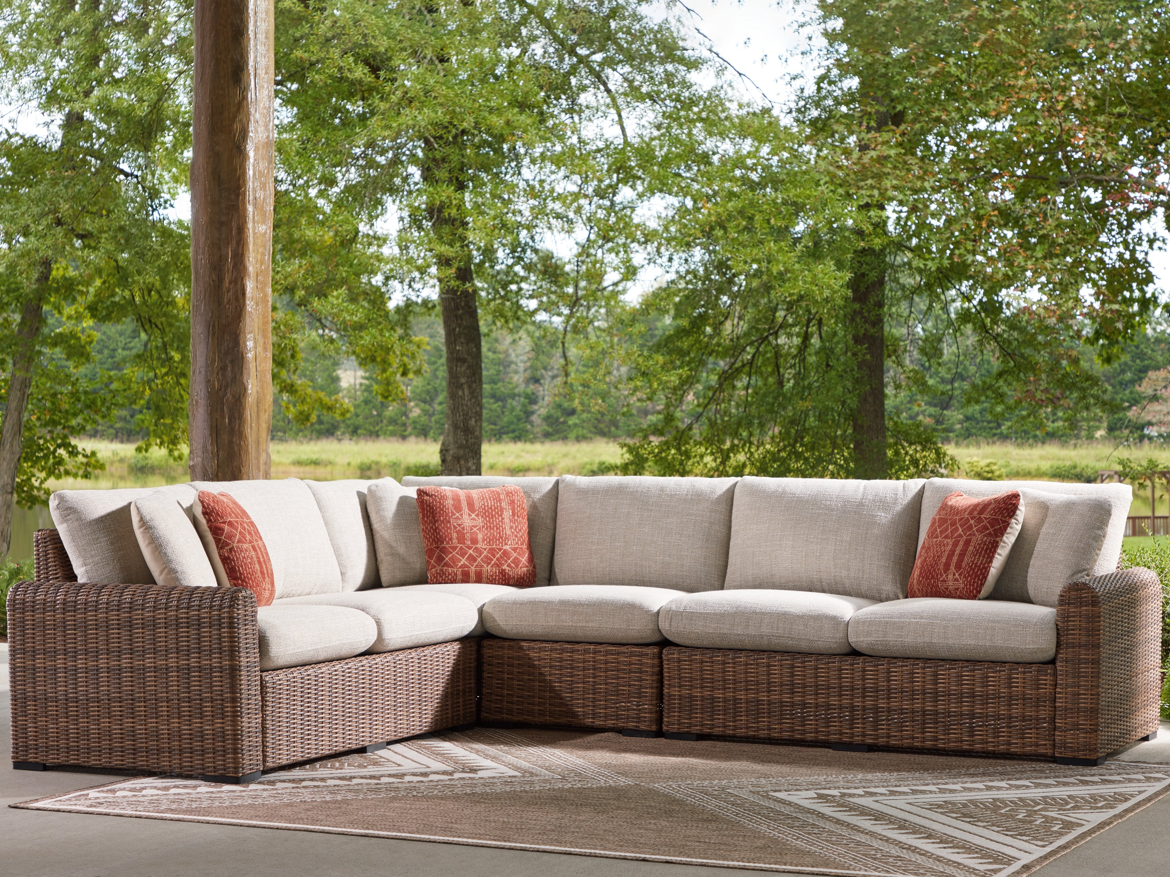 Elite Furniture Outlet - Ashley Furniture - Dolan Creek Outdoor - 4-Piece Outdoor Sectional / Beige/Brown - PCP610P2