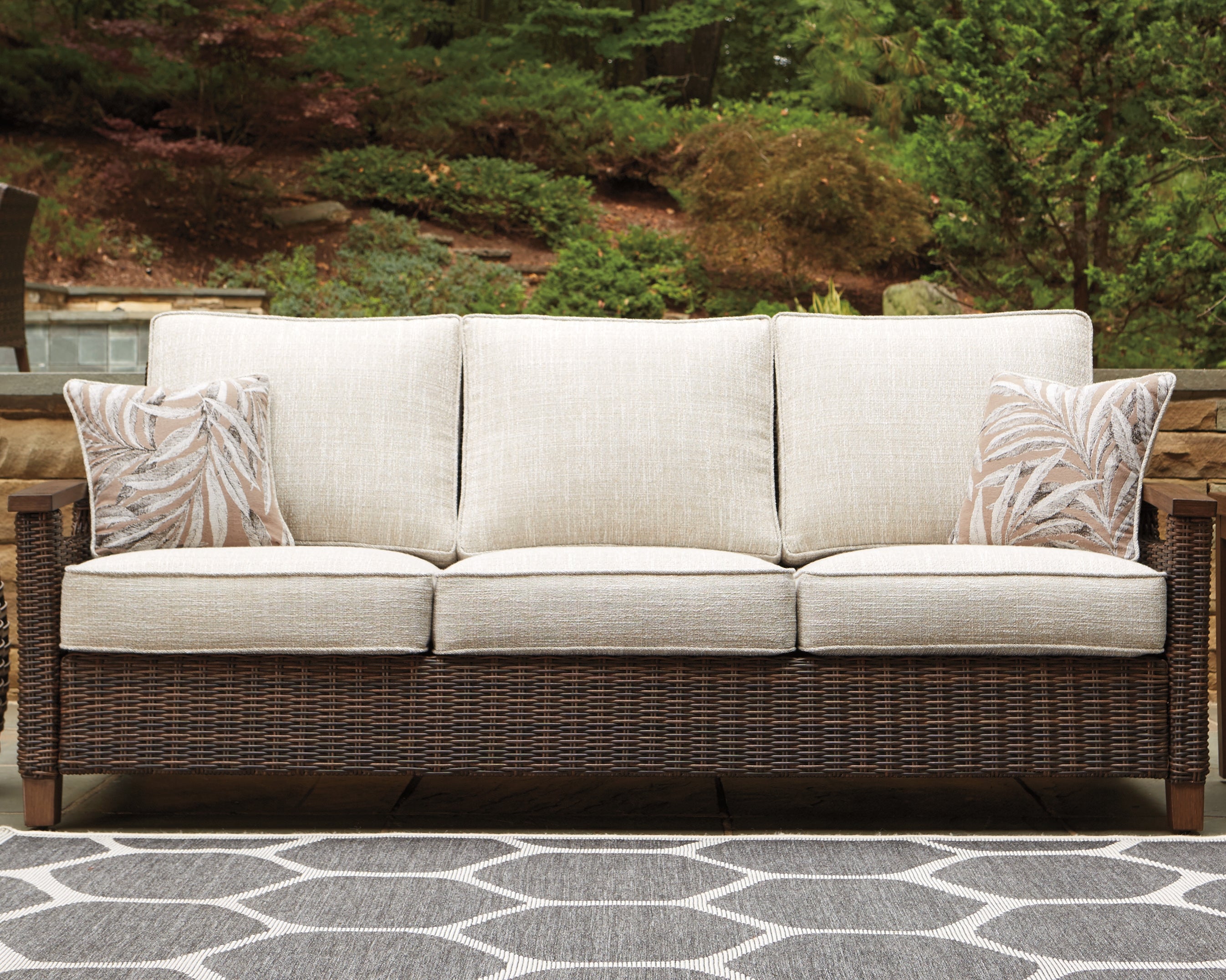 Elite Furniture Outlet - Ashley Furniture - Paradise Trail Outdoor - Sofa with Cushion / Medium Brown - P750-838