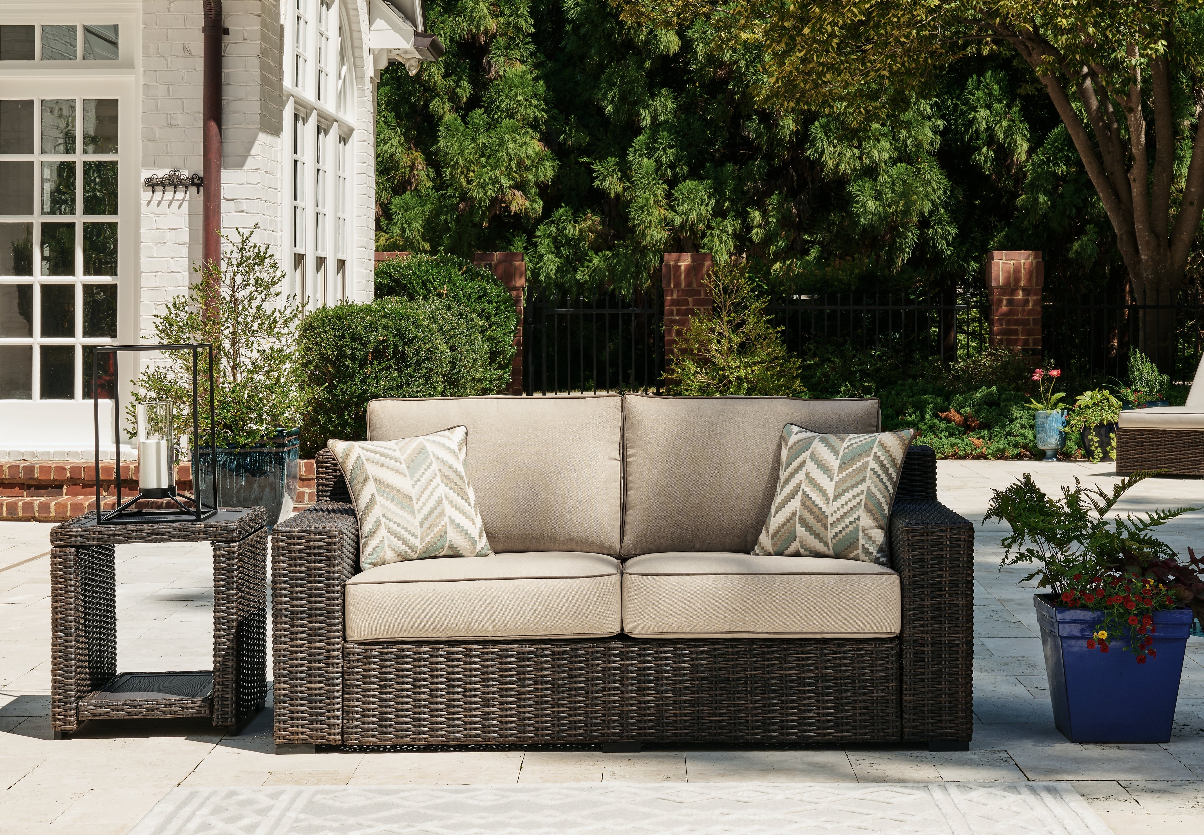 Elite Furniture Outlet - Ashley Furniture - Coastline Bay Outdoor - Loveseat w/Cushion / Brown - P784-835