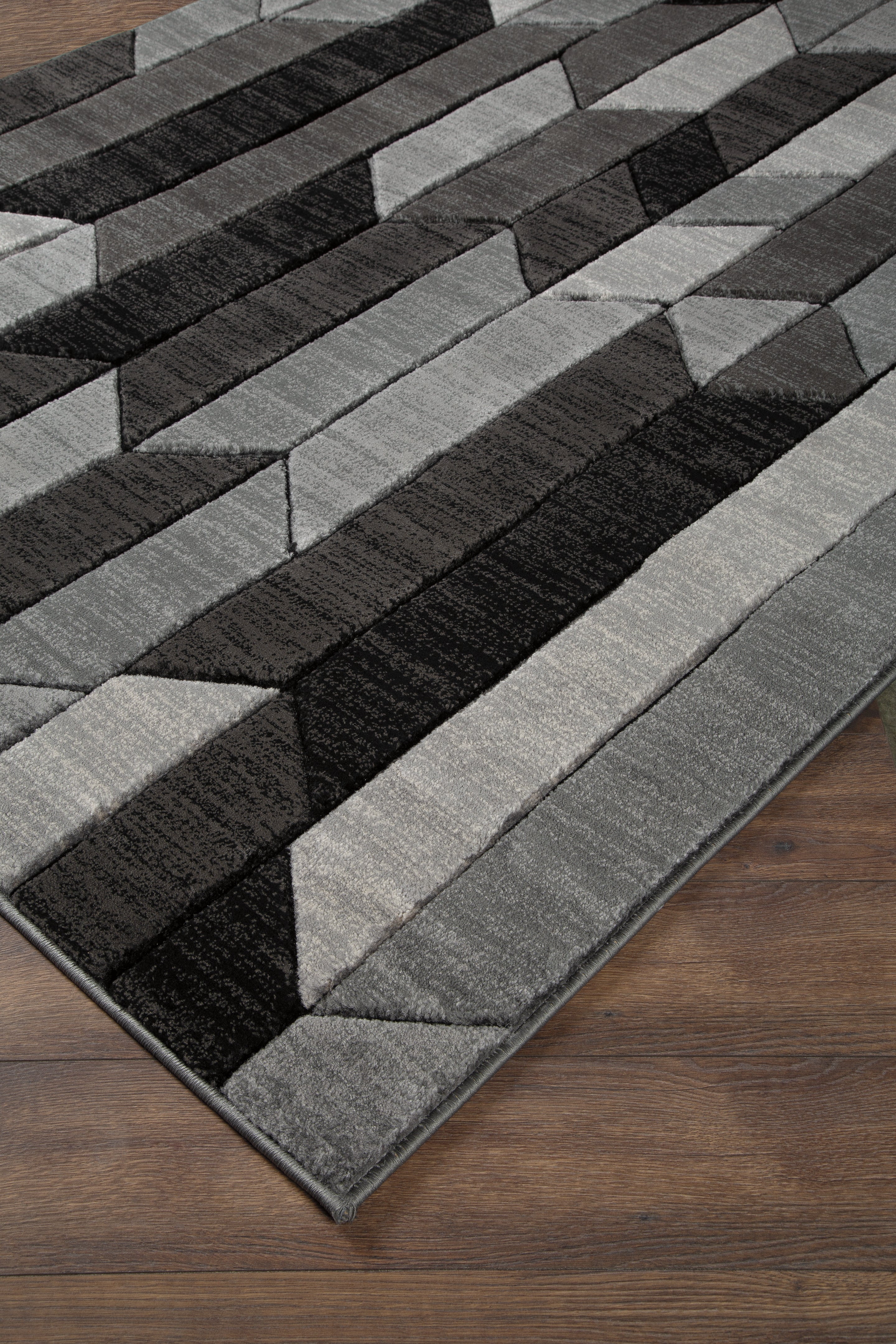 Elite Furniture Outlet - Ashley Furniture - Chayse Rug - 6'6" x 9'6" Rug / Black/Gray - R403461