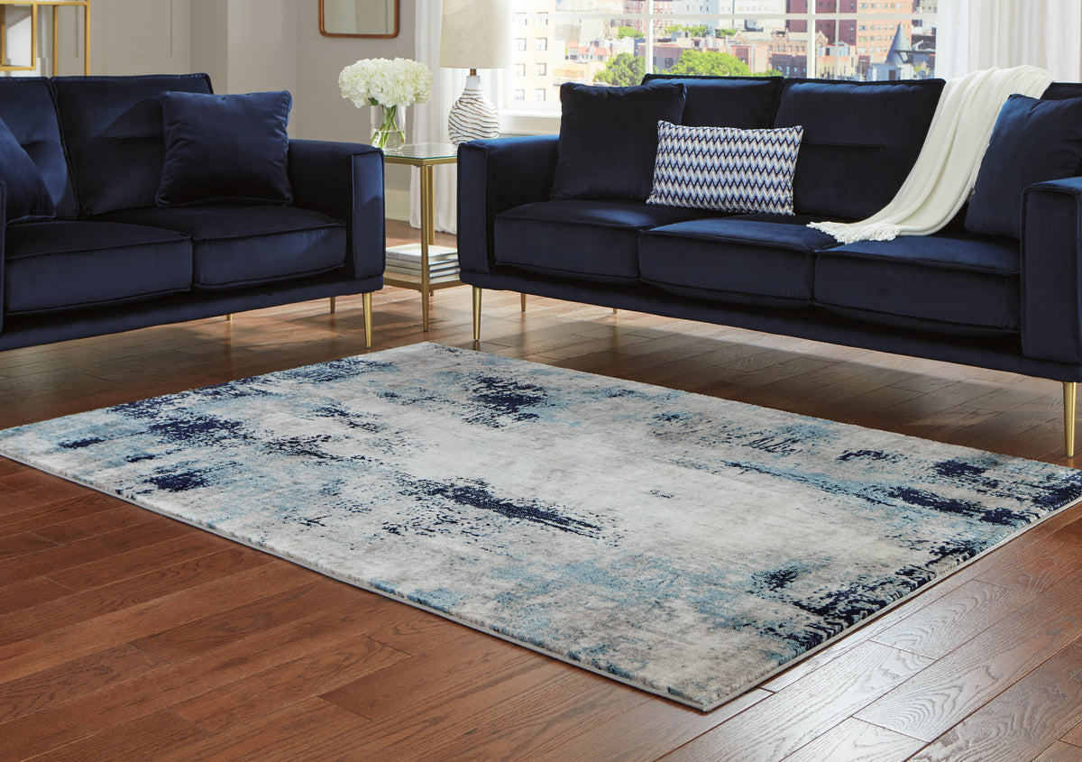Elite Furniture Outlet - Ashley Furniture - Leonelle Rug - 7'10" x 10' Rug / White/Blue/Gray - R404871