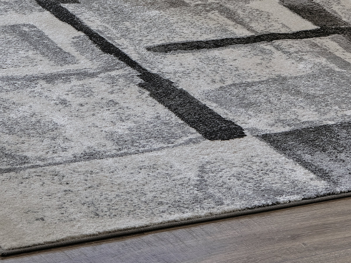Elite Furniture Outlet - Ashley Furniture - Brycebourne Rug - 5'3" x 7'7" Rug / Black/Cream/Gray - R404982