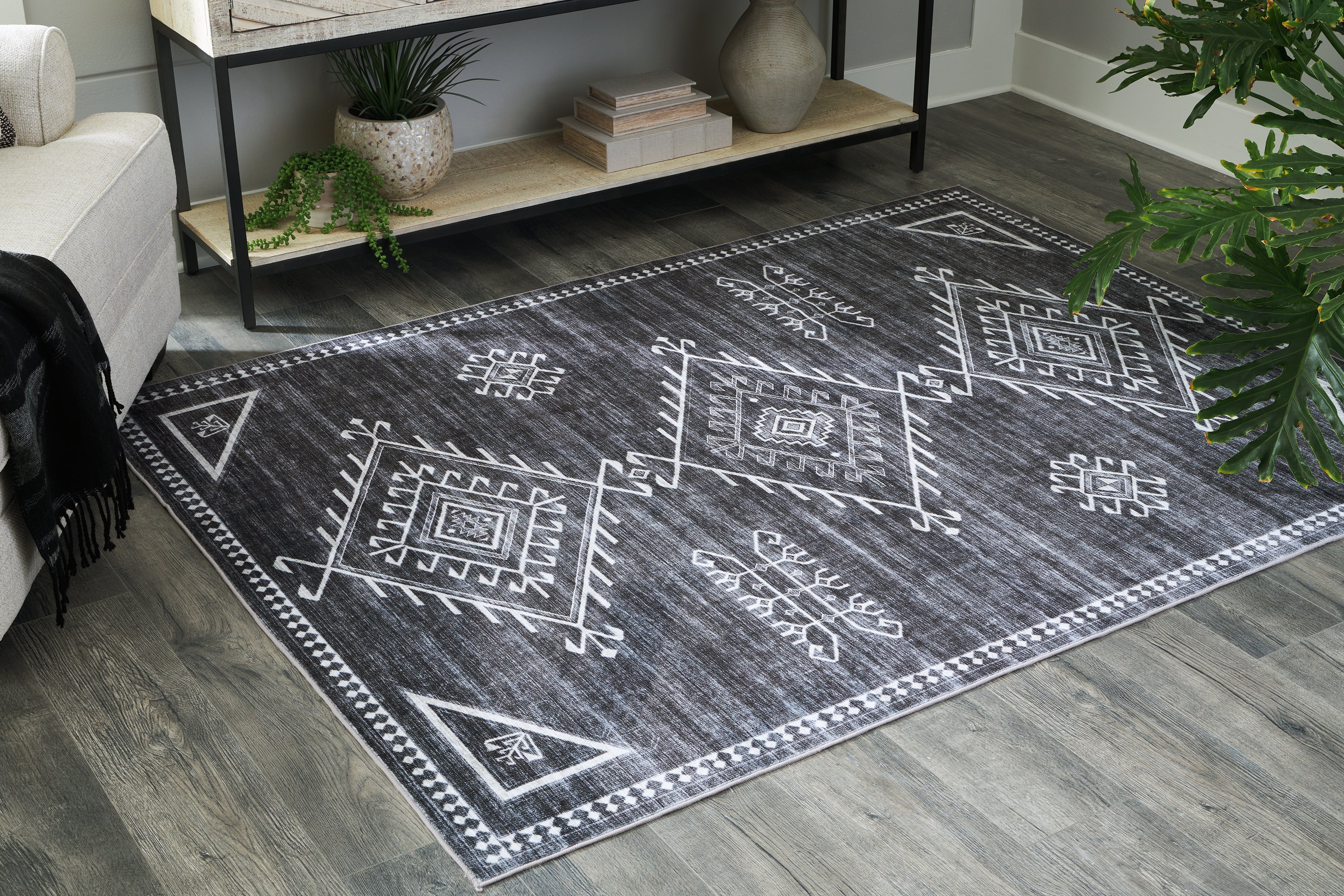 Elite Furniture Outlet - Ashley Furniture - Arloman Rug - 5' x 7' Washable Rug / Black/Cream/Gray - R405932