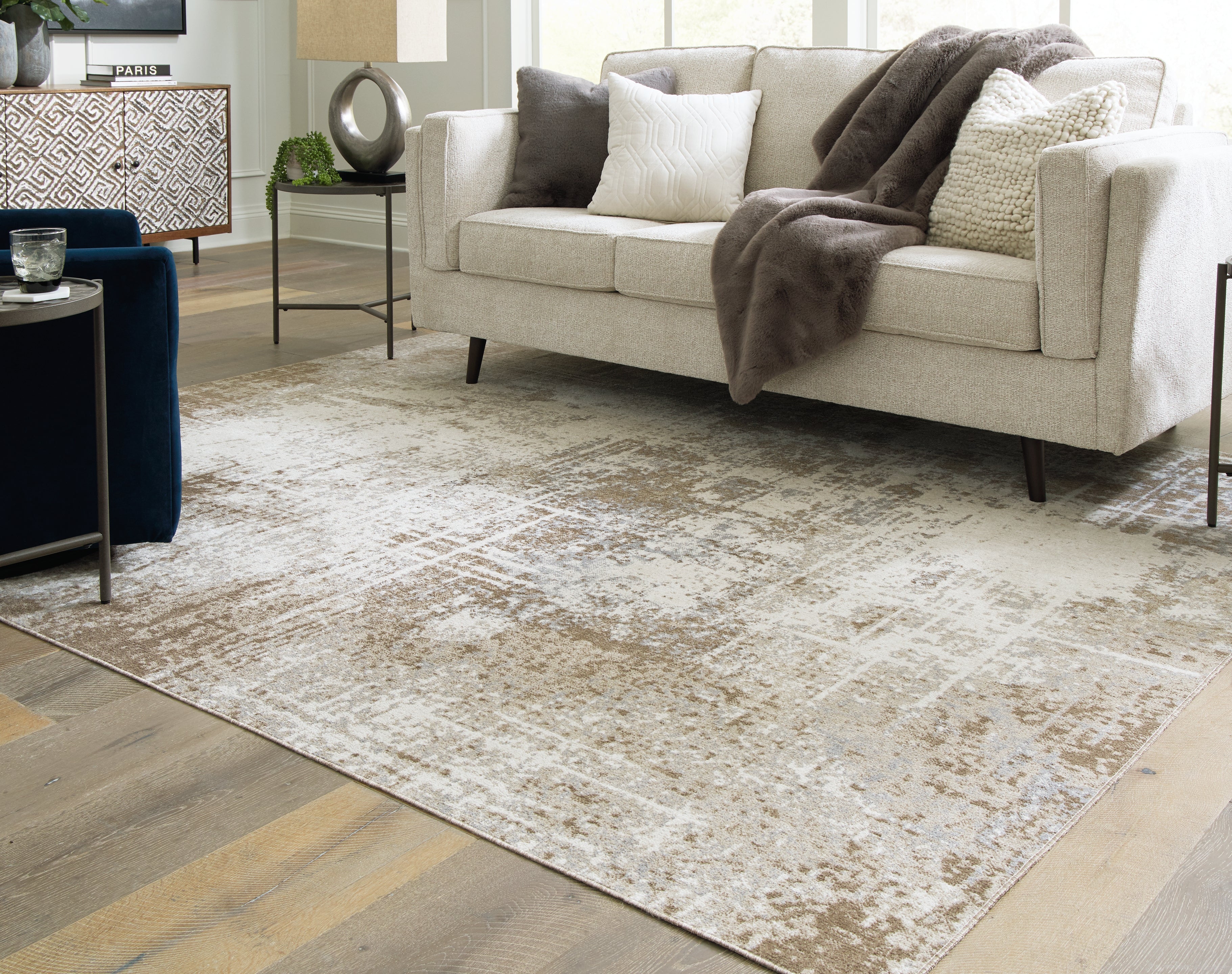 Elite Furniture Outlet - Ashley Furniture - Grifflain Rug - 7'10" x 10'3" Washable Rug / Tan/Brown/Gray - R406231